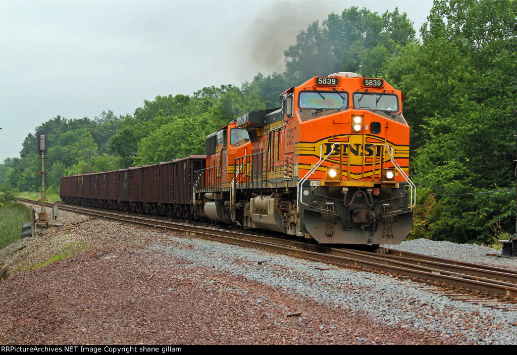 BNSF 5839 Brings a ore train off the connection track onto the Up.